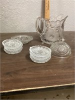 Pitcher and coasters