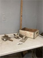 Concrete tools and 7-Up box