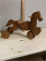 Wooden horse toy with wheels