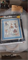 Lot with cross stitch templates and kits
