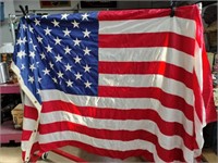 50 star United States flag some damage battle