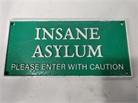 Cast iron insane asylum sign 11x5