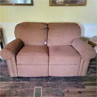 Dual Reclining Fabric Loveseat (has a hole in one