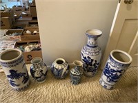 Blue and white vases and two umbrella holders