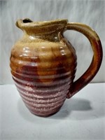 Pottery pitcher 10 in tall