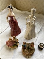 Two music boxes and figurines