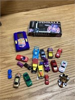 Vintage toy cars and a pinball game