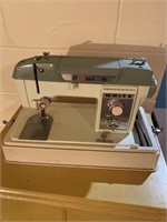 Sewing machine, stand, and sewing supplies