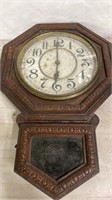 Antique wood wall clock