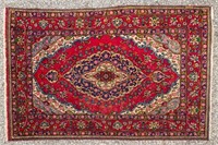 Hand-knotted Persian carpet