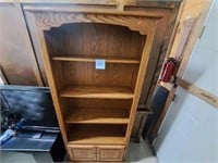 4 tier wood book/media cabinet w/ 2 door storage..
