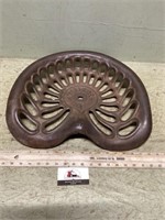 Cast iron weir implement seat