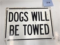 Metal sign dogs will be towed
