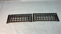 Pair of cast-iron heating grate covers