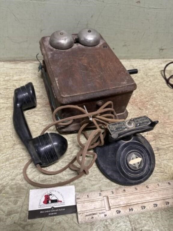 Vintage oak crank telephone rings