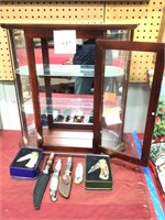 6 Knives with glass cabinet