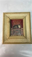 Print of a cat in a wooden frame