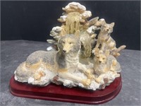 Wolf Family at waterfall resin art. Approx. 9”