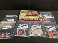AT LEAST 40 NASCAR TRADING CARDS INSIDE SCHOOL