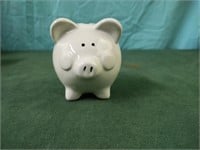 Small white piggy bank