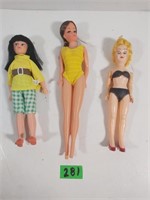 3 Plastic dolls