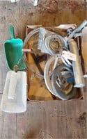 2 PLASTIC FEED SCOOPS- SEWER SNAKE AND CONTENTS