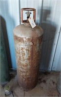 LARGE PROPANE TANK- AT LEAST PARTIALLY FULL