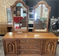 Eighties style dresser with matching mirrors.