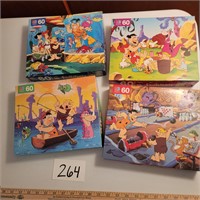 Four Milton Bradley Flintstones' Puzzles