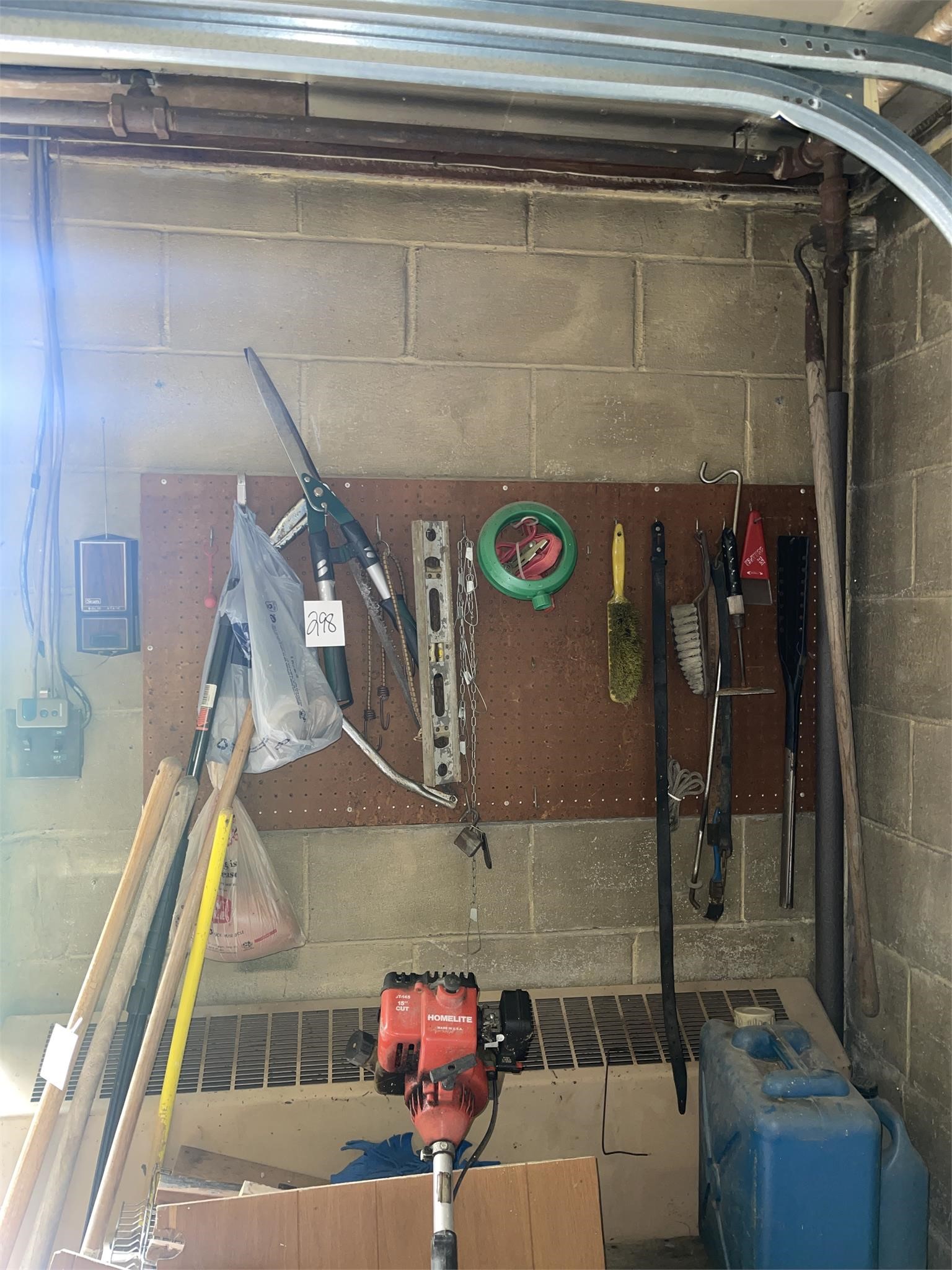 mixed tools hanging on wall
