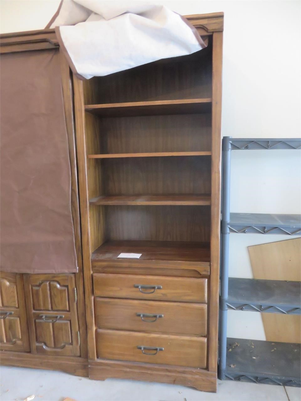 Bookcase with drop down cover
