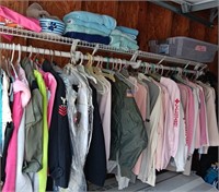 All the clothes on the rack and the garage.
