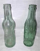 Vintage Pepsi aqua 6.5 oz. pop bottles.