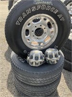 4 Firestone LT265/75R16 tires on 8 lug GM rims