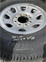 4 Michelin LT275/70R18 tires on stock GM rims 8
