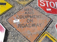 metal sign "Men and Equipment on Roadway"