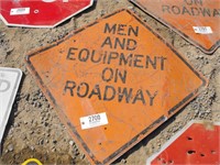 metal sign "Men and Equipment on Roadway"