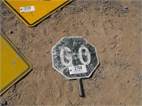 metal hand-held sign  "Go/Stop"