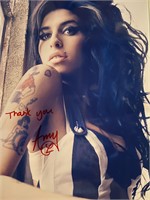 Amy Winehouse signed photo. 8x10 inches