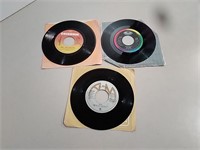 Three 7" Records Incl. Styx