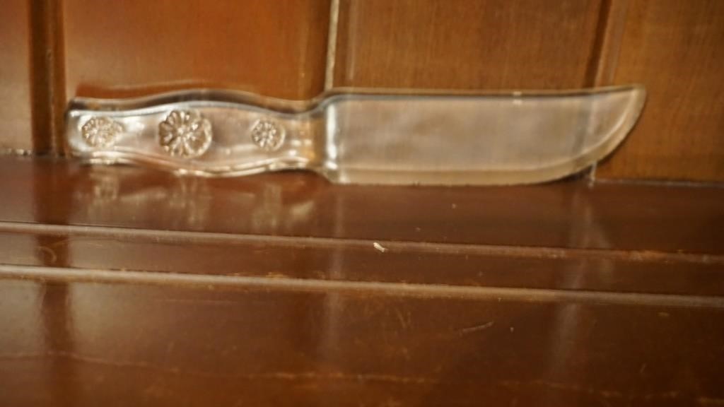 Clear glass knife with flowers on handle