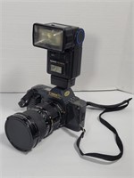 Cannon T70 Camera and Flash with 35 to 105mm Lens