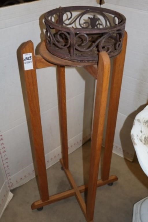 CAST IRON PLANT BASE AND WOODEN STAND