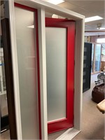 Red exterior door with frosted glass