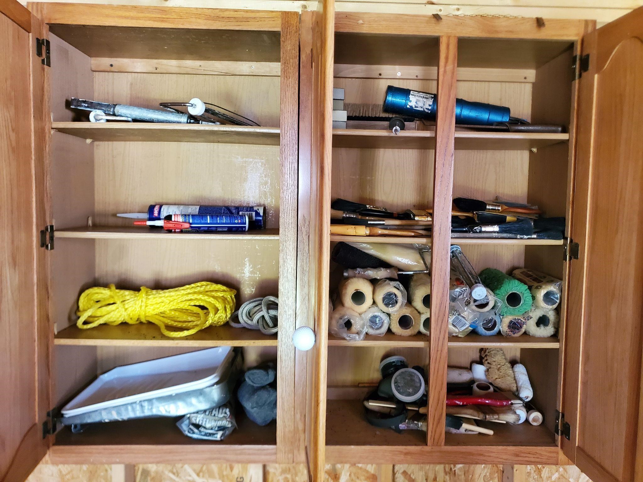 Contents in cabinet paint tools and supplies