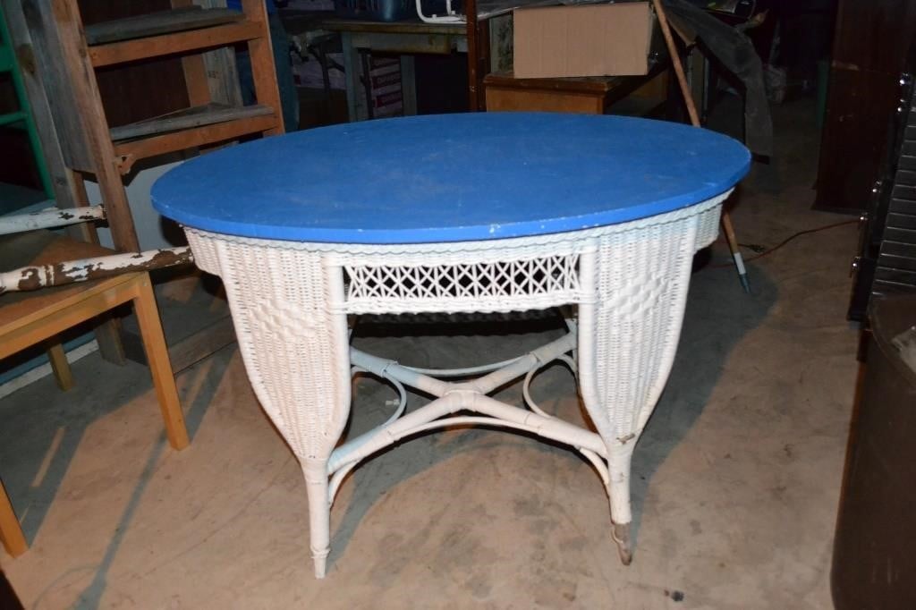 White wicker table with wooden top