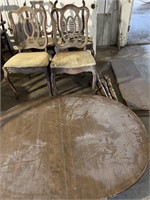 Dining table, four chairs (damaged)
