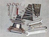 Adjustable wrenches and wrenches in tote