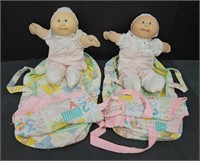 (E) Cabbage Patch Kids Dolls With Carriers.
