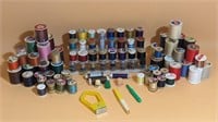 SPOOLS OF THREAD AND BOBBINS OF THREAD WITH STAND